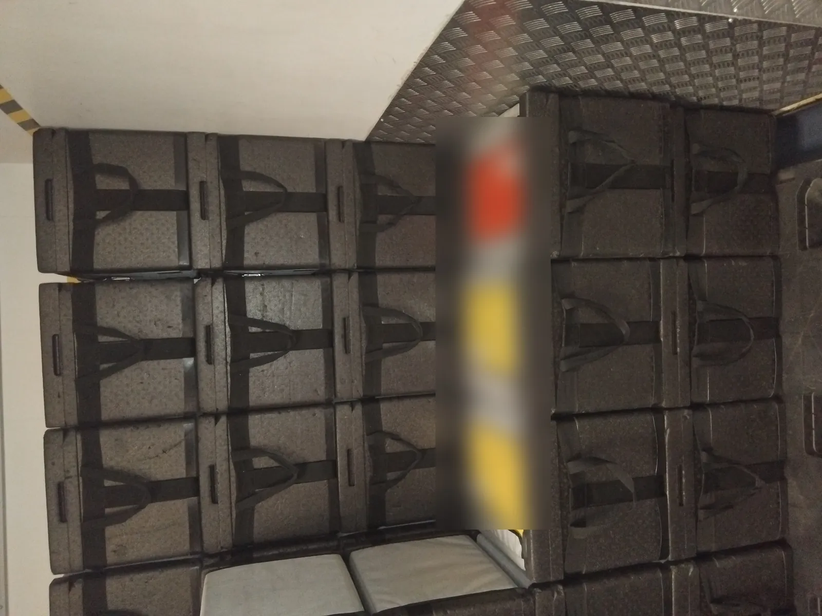 Inside a Red Eagle Logistics courier van loaded with insulated transport boxes on a dedicated same-day run